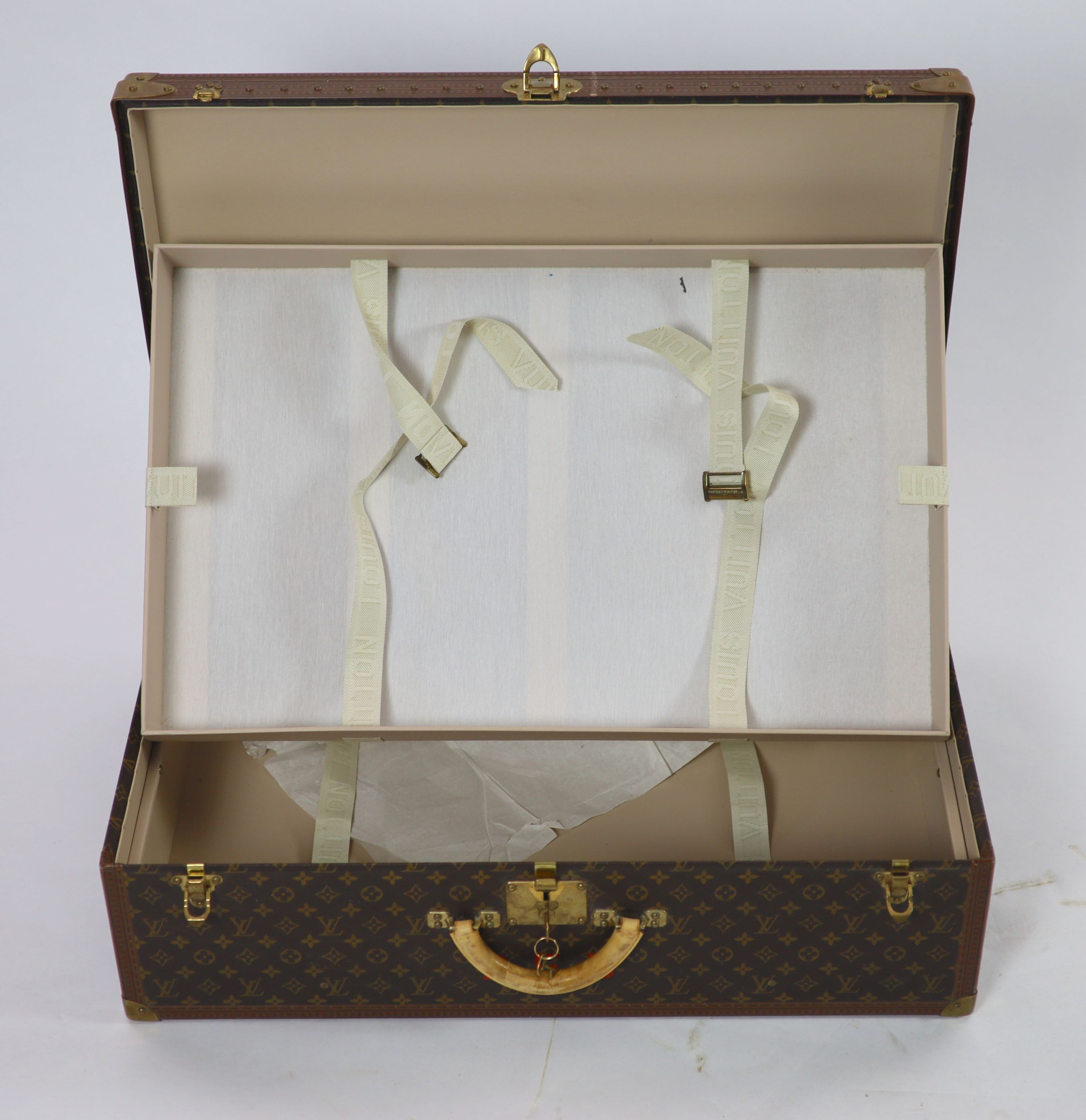 A modern Louis Vuitton Alzer 80 suitcase trunk, 80.5cm wide